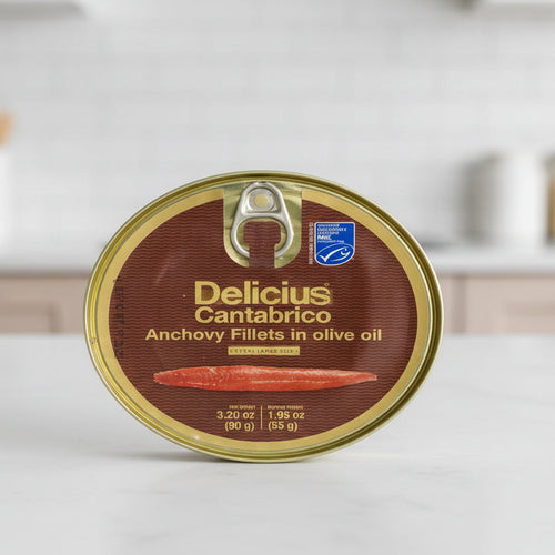 Can of Delicius Cantabrico Anchovy Fillets in olive oil on a white background